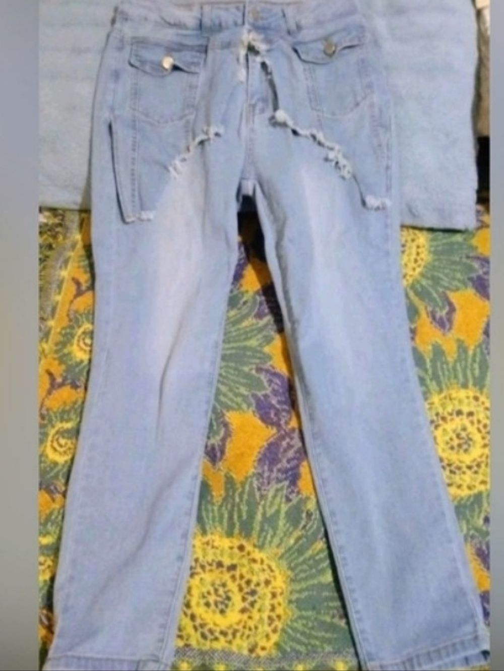 Women’s Light Blue Skinny Jeans with Distressed Detailing
